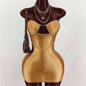 Elegant Gold Strapless Dress . I have a medium and a large ! Both for 20